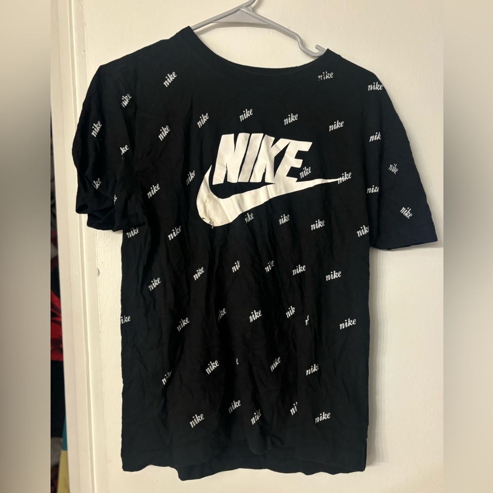 Nike black T-shirt with a flaw